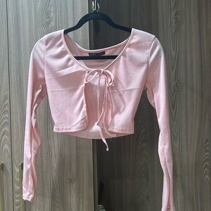 Pink cropped long sleeve tie top